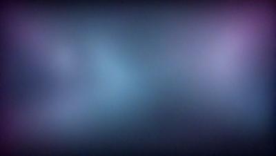 The primary subject of the image is a blue sky with clouds. The setting is a dark, foggy sky, creating a moody atmosphere. The visual style is a photo, capturing the beauty of the cloudy sky. The colors and mood are predominantly dark and dramatic, with the blue sky and clouds providing a sense of depth and contrast.