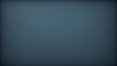 The primary subject of the image is a large, dark blue sky. The setting is a vast, open space with no visible landmarks or objects. The visual style is a natural, untouched landscape. The colors and mood are predominantly dark and moody, with the blue sky serving as the main focal point.