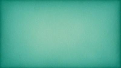 The primary subject of the image is a large, empty, and bright green wall. The setting is a room with a green background, and the visual style is a photo. The colors and mood of the image are predominantly green, creating a calm and serene atmosphere.