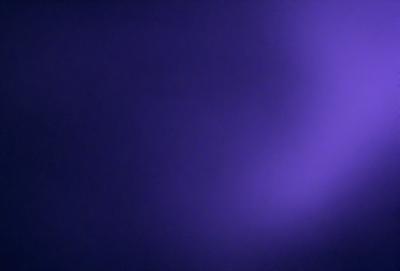 The primary subject of the image is a purple background. The setting is a dark, empty space with no visible objects or people. The visual style is a digital art or illustration, as the purple background appears to be a digital creation. The colors and mood of the image are predominantly purple, creating a calm and serene atmosphere.