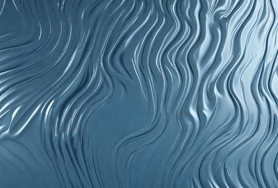 The primary subject of the image is a blue surface with a pattern of waves. The setting is a blue ocean, and the visual style is a photo. The dominant colors are blue and silver, creating a calm and serene atmosphere.