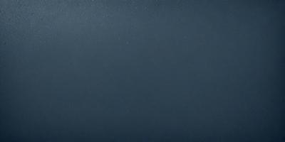 The primary subject of the image is a dark blue sky with a few stars visible. The setting is a nighttime sky, and the visual style is a photo. The colors and mood of the image are predominantly dark and moody, with the blue sky and stars creating a sense of depth and tranquility.