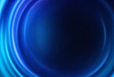 The primary subject of the image is a blue circle, which appears to be a blue circle of light. The setting is a dark background, which contrasts with the bright blue circle. The visual style is a close-up of the blue circle, emphasizing its vibrant color. The colors and mood of the image are predominantly blue, creating a calm and serene atmosphere.