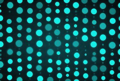 The primary subject of the image is a pattern of blue dots on a black background. The setting is a dark, blue-toned environment, which creates a moody and atmospheric mood. The visual style is a combination of digital art and illustration, as the dots are arranged in a visually appealing manner. The colors and mood of the image are predominantly blue, with the black background providing a stark contrast to the blue dots.