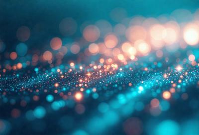 The primary subject of the image is a blue background with a pattern of bright, colorful lights. The setting appears to be a dark room, and the visual style is a combination of a photo and digital art. The colors and mood of the image are vibrant and lively, with the bright lights creating a sense of energy and movement.