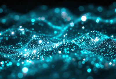 The primary subject of the image is a blue, swirling, and sparkling pattern. The setting is a dark background, which contrasts with the bright blue swirls. The visual style appears to be a digital art or illustration, as the swirls and sparkles are created through a computer-generated design. The dominant colors are blue and black, giving the image a vibrant and dynamic atmosphere.