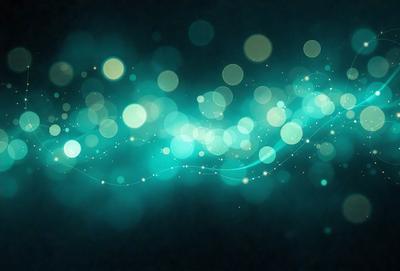 The primary subject of the image is a blue and green light effect, which appears to be a digital art or illustration. The setting is a dark background, and the visual style is a combination of colors and patterns. The dominant colors are blue and green, creating a calming and serene atmosphere.