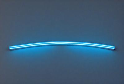 The primary subject of the image is a blue light, which appears to be a neon light or a blue glowing line. The light is located on a wall, and it seems to be the main focus of the image. The setting is a white wall, which provides a clean and minimalistic background for the blue light. The visual style of the image is a close-up of the blue light, emphasizing its glow and intensity. The colors and mood of the image are predominantly blue, creating a calm and ser