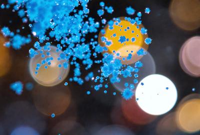 The primary subject of the image is a blue and yellow pattern, which appears to be a digital art or illustration. The setting is a dark background, and the visual style is a close-up of the pattern. The dominant colors are blue and yellow, creating a vibrant and lively atmosphere.