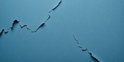 The primary subject of the image is a piece of metal, possibly a piece of a broken scissor, with a blue background. The metal is in the shape of a line, and it appears to be a part of a larger piece of metal. The visual style of the image is a close-up of the metal, showcasing its texture and details. The colors in the image are predominantly blue, creating a calm and serene atmosphere.