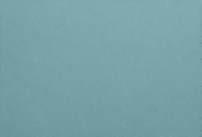 The primary subject of the image is a blue wall. The setting is a room with a blue wall, and the visual style is a photo. The dominant colors are blue, and the overall atmosphere is calm and serene.
