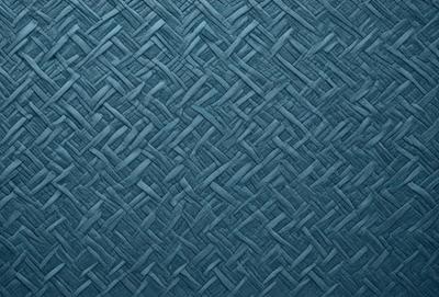 The primary subject of the image is a blue, woven fabric with a pattern of interlocking diamond shapes. The setting is a blue background, which complements the fabric's color. The visual style is a close-up of the fabric, showcasing its intricate design. The colors and mood of the image are predominantly blue, creating a calm and serene atmosphere.