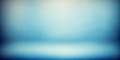 The primary subject of the image is a large, empty, and dark blue sky. The setting is a vast, open space with no visible landmarks or objects. The visual style is a realistic representation of the sky, and the colors and mood convey a sense of calmness and tranquility.
