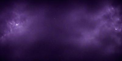 The image is a purple sky with a star in the middle. The sky appears to be cloudy, and the star is the main focus of the scene. The overall atmosphere is calm and serene.