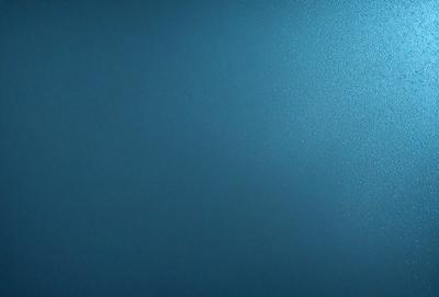 The primary subject of the image is a blue wall. The setting is a room with a blue wall, and the visual style is a photo. The dominant colors are blue, and the overall atmosphere is calm and serene.