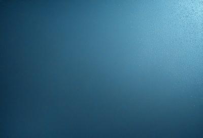 The primary subject of the image is a blue wall. The setting is a room with a blue wall, and the visual style is a photo. The dominant colors are blue, and the overall atmosphere is calm and serene.