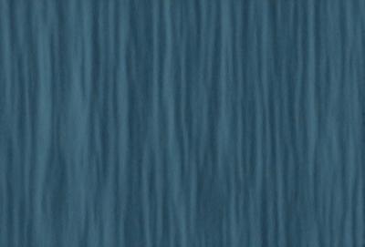 The primary subject of the image is a blue wall with a patterned texture. The setting is a room with a blue wall, and the visual style is a patterned texture. The dominant colors are blue and the overall atmosphere is calm and soothing.