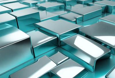 The primary subject of the image is a large, intricate pattern made up of many small, shiny, blue and silver squares. The setting is a blue background, which contrasts with the silver squares. The visual style is a combination of digital art and illustration, creating a unique and eye-catching design. The colors and mood of the image are predominantly blue and silver, giving it a modern and sophisticated appearance.