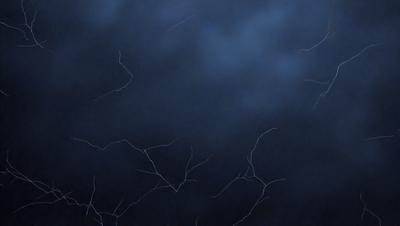 The primary subject of the image is a dark, cloudy sky with lightning streaks. The setting is a nighttime scene with a cloudy background. The visual style is a black and white photo, giving it a classic and dramatic appearance. The colors and mood are predominantly dark and moody, with the lightning adding a sense of intensity and drama to the scene.