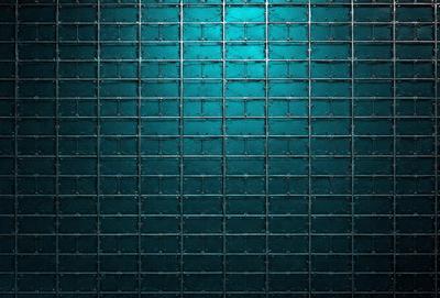 The primary subject of the image is a blue and green patterned wall. The setting is a dark room with a blue and green patterned wall. The visual style is a patterned wall, which gives the image a unique and artistic appearance. The dominant colors are blue and green, creating a calm and soothing atmosphere.