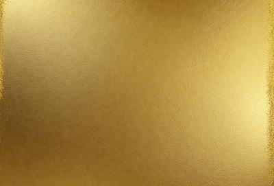 The primary subject of the image is a large, shiny, and golden wall. The setting is a room with a wall that is covered in a gold-colored material, giving it a luxurious and elegant appearance. The visual style of the image is a close-up of the wall, emphasizing its texture and color. The colors and mood of the image are predominantly gold, creating a warm and inviting atmosphere.