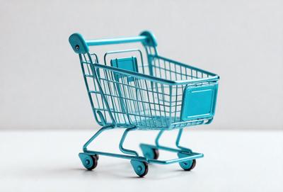 The primary subject of the image is a blue shopping cart. The cart is filled with books, creating a unique and eye-catching scene. The setting is a white background, which provides a clean and uncluttered environment for the cart and its contents. The visual style of the image is a combination of photo and digital art, as it captures the cart and its books in a realistic yet artistic manner. The colors and mood of the image are predominantly blue, which gives the scene a calm and inviting