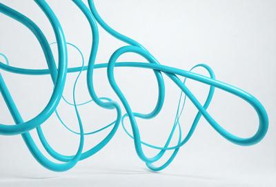 The primary subject of the image is a blue, twisted, and curled wire. The setting is a white background, which provides a clean and minimalist appearance. The visual style is a close-up of the blue wire, showcasing its intricate pattern and texture. The colors and mood of the image are predominantly blue, creating a calm and serene atmosphere.