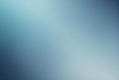 The primary subject of the image is a blue sky with a white background. The visual style appears to be a photo, and the colors and mood are predominantly blue and white, creating a serene and calming atmosphere.