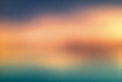 The primary subject of the image is a cloudy sky. The setting is a cloudy sky with a blue background. The visual style is a photo of the cloudy sky. The colors and mood of the image are predominantly blue and cloudy, creating a calm and serene atmosphere.
