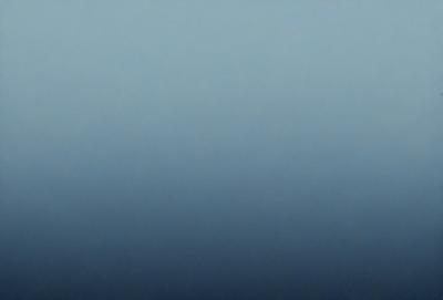 The primary subject of the image is a large, dark blue sky. The setting is a vast, open space with no visible landmarks or objects. The visual style is a natural, outdoor scene with no indication of digital art or illustration. The colors and mood of the image are predominantly dark and moody, with the blue sky serving as the main focal point.