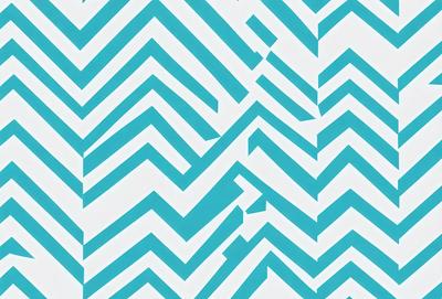 The primary subject of the image is a blue and white patterned wallpaper. The setting is a room with a blue and white checkered pattern on the wall. The visual style is a patterned wallpaper, which gives the room a unique and modern appearance. The dominant colors are blue and white, creating a calm and soothing atmosphere in the room.