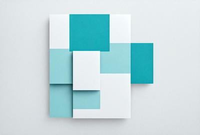 The primary subject of the image is a square piece of paper with a blue and white color scheme. The paper is cut into four smaller squares, each with a different color combination. The setting is a white background, which provides a clean and minimalist appearance. The visual style is a simple and straightforward representation of the paper squares. The colors and mood of the image are calm and soothing, with the blue and white color palette creating a sense of tranquility.