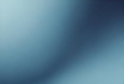The primary subject of the image is a blue background with a white light shining through it. The setting appears to be a dark room, and the visual style is a combination of a photo and a digital art. The colors and mood of the image are predominantly dark and moody, with the blue background and white light creating a sense of depth and contrast.