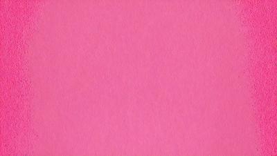 The primary subject of the image is a pink background. The setting is a blank, unadorned wall. The visual style is a close-up of the pink background, which gives the image a simple and clean appearance. The colors and mood of the image are predominantly pink, creating a warm and inviting atmosphere.