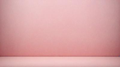 The primary subject of the image is a pink wall. The setting is a room with a pink wall, and the visual style is a photo. The dominant colors in the image are pink, and the overall atmosphere is warm and inviting.