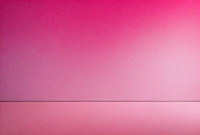 The primary subject of the image is a pink background. The setting is a wall, and the visual style is a photo. The dominant colors are pink, and the overall atmosphere is warm and inviting.
