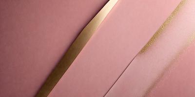 The primary subject of the image is a pair of scissors, which are placed on a pink surface. The setting is a room with a pink background, and the visual style appears to be a photo. The colors in the image are predominantly pink, creating a warm and inviting atmosphere.