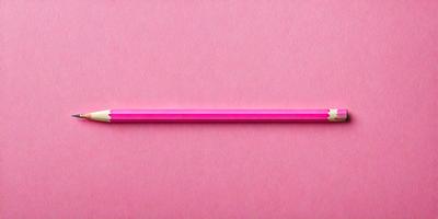 The primary subject of the image is a pink pencil. The setting is a pink background, which creates a visually appealing contrast with the pink pencil. The visual style is a close-up of the pencil, emphasizing its color and texture. The colors and mood of the image are predominantly pink, creating a warm and inviting atmosphere.