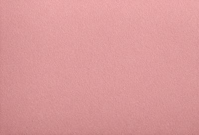 The primary subject of the image is a pink surface, which appears to be a piece of pink paper or a pink background. The setting is a blank, uncluttered space, which gives the image a clean and minimalist appearance. The visual style is a close-up of the pink surface, emphasizing its color and texture. The colors and mood of the image are predominantly pink, creating a warm and inviting atmosphere.