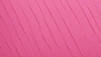 The primary subject of the image is a pink surface, which appears to be a piece of wood or a wall. The setting is a room with a pink background, and the visual style is a close-up of the pink surface. The colors and mood of the image are predominantly pink, creating a warm and inviting atmosphere.