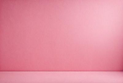 The primary subject of the image is a pink wall. The setting is a room with a pink wall, and the visual style is a photo. The dominant colors in the image are pink, and the overall atmosphere is warm and inviting.