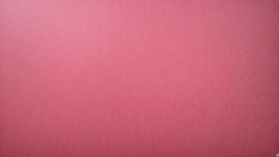 The primary subject of the image is a pink background. The setting is a red wall, and the visual style is a close-up of the wall. The colors and mood of the image are predominantly pink, creating a warm and inviting atmosphere.