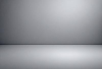 The primary subject of the image is a white wall. The setting is a plain, empty room with a white wall as the main focus. The visual style is a photo, capturing the starkness of the white wall. The colors and mood are predominantly white, creating a clean and minimalist atmosphere.