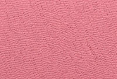 The primary subject of the image is a close-up of a pink background with a pattern of yarn or a knitted surface. The setting is a pink wall, and the visual style appears to be a photo or a close-up of a knitted surface. The colors and mood of the image are predominantly pink, creating a warm and inviting atmosphere.