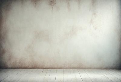 The primary subject of the image is a white wall with a brown texture. The setting is a room with a wooden floor. The visual style is a photo, and the colors and mood are predominantly white and neutral, creating a clean and minimalist atmosphere.