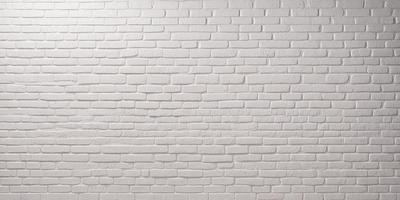 The primary subject of the image is a white brick wall. The setting is a plain white wall, with no visible background or environment. The visual style is a photo, showcasing the brick wall in detail. The colors and mood of the image are predominantly white, giving it a clean and minimalist appearance.