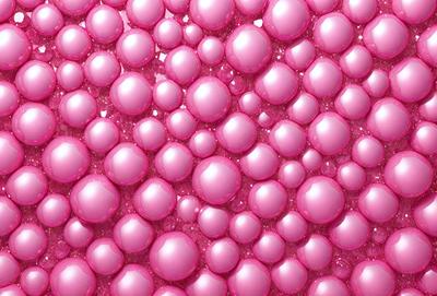 The primary subject of the image is a close-up of a pink surface with a pattern of pink bubbles. The setting is a pink background, and the visual style appears to be a digital art or illustration. The dominant colors in the image are pink, and the overall atmosphere is bright and cheerful.
