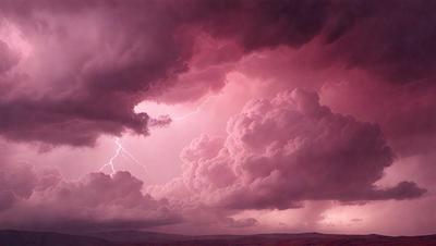 The primary subject of the image is a cloudy sky with a purple hue. The setting is a mountainous landscape, with a mountain range visible in the background. The visual style is a photo, capturing the beauty of the sky and the surrounding environment. The colors and mood of the image are dramatic and serene, with the purple clouds creating a striking contrast against the natural landscape.