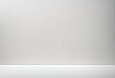 The primary subject of the image is a white sheet of paper. The setting is a plain white background, and the visual style is a simple, clean, and minimalist design. The colors and mood of the image are predominantly white, creating a sense of simplicity and cleanliness.