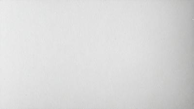 The primary subject of the image is a white wall. The setting is a room with a white wall, and the visual style is a photo. The colors and mood of the image are predominantly white, giving it a clean and minimalist appearance.